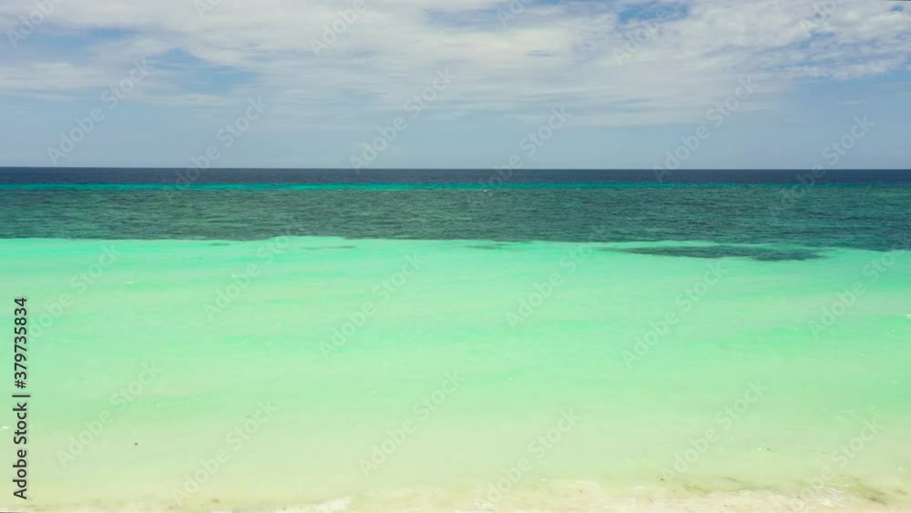 Aerial view of shot of turquoise water - space for text. Blue lagoon water surface. Aerial view of shot of turquoise water - space for text. Blue lagoon water surface.