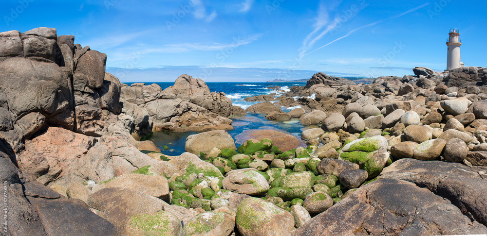 Landscape and Light House at the Coast of Muxia (in Spanish Playa de Mugía) Northern Spain Galicia Pedra da Garza Costa da Morte Landscape and Light House at the Coast of Muxia (in Spanish Playa de Mugía) Northern Spain Galicia Pedra da Garza Costa da Morte