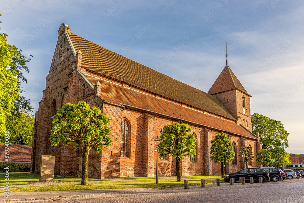 Fototapeta premium A medieval lutheran church built in red bricks in the center of Ribe town