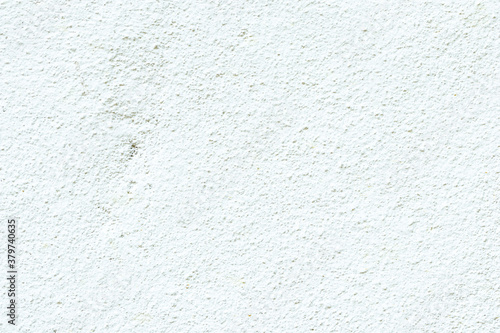 Blank concrete white rough wall for background. Beautiful white cement wall plastered surface background pattern.