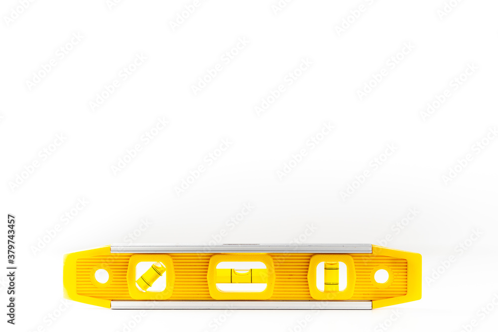Yellow building bubble level isolated on the white background Yellow building bubble level isolated on the white background