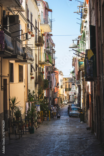 Fototapeta Naklejka Na Ścianę i Meble -  Classical romantic small street in the historical center of Naples, Italy. Toned picture