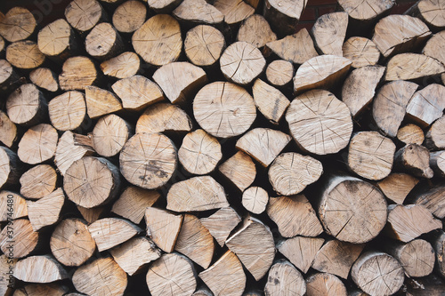 Stack of piled firewood for grunge background
