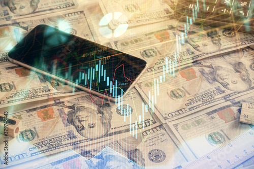 Double exposure of forex graph drawing over us dollars bill background. Concept of financial markets.