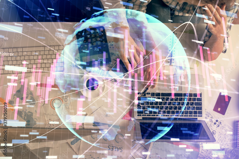 Double exposure of man and woman working together and financial graph hologram drawing. market analysis concept. Computer background. Top View. Double exposure of man and woman working together and financial graph hologram drawing. market analysis concept. Computer background. Top View.