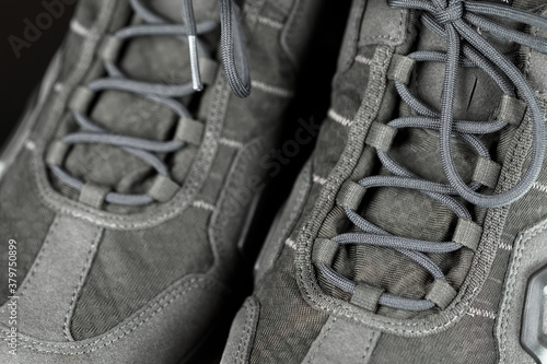 laces of trekking sneakers, close-up view