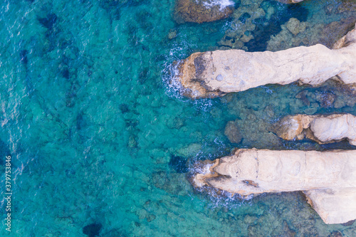 an aerial view of white rock formations on the seafront coastline of Limassol in Cyprus