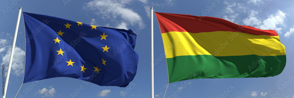 Obraz premium Waving flags of the European Union and Bolivia on flagpoles, 3d rendering