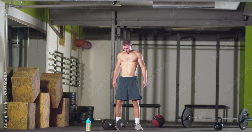 Man ready to lift weights Man ready to lift weights