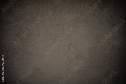 scratched concrete stone wall vintage background with vignette