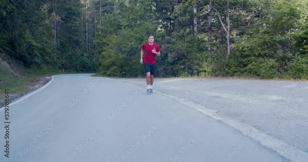 Slow mo sprint and endurance training, running man, dolly shot Slow mo sprint and endurance training, running man, dolly shot