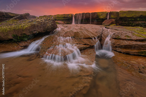 Colourful Sunset near Water stream at Karmih Varieties Spot near Cherrapunji  Meghalaya India