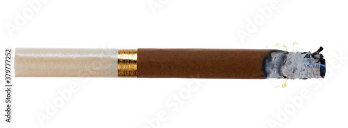 Lit brown cigarette isolated on white background