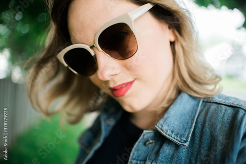 A woman wearing sunglasses photo