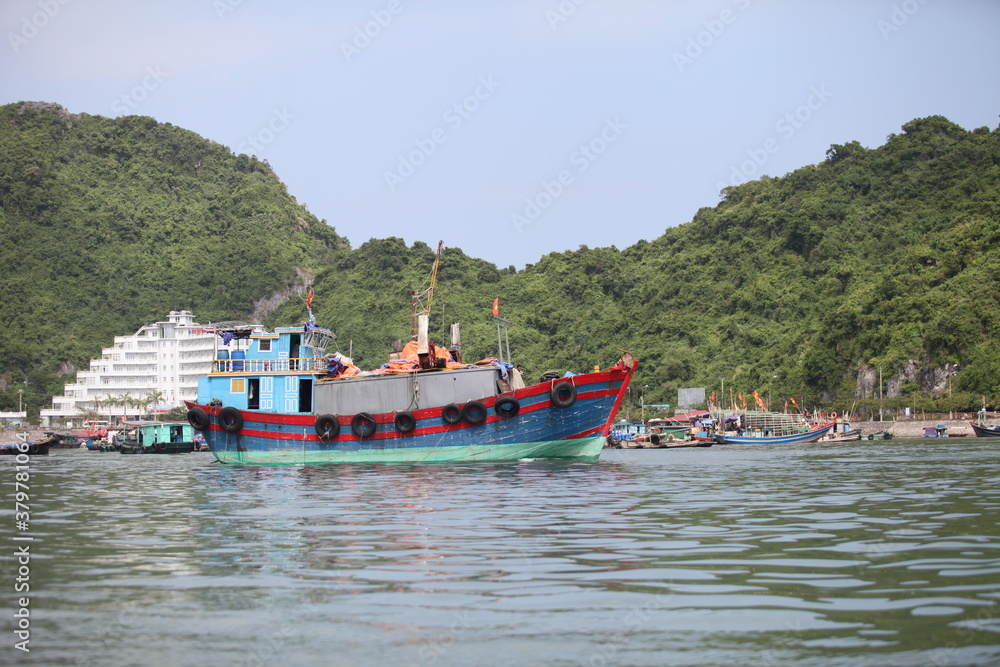 Floating Fishing Village In The Ha Long Bay. Cat Ba Island, Vietnam Asia. Cat Ba, Vietnam - March 5, 2020 Floating Fishing Village In The Ha Long Bay. Cat Ba Island, Vietnam Asia. Cat Ba, Vietnam - March 5, 2020