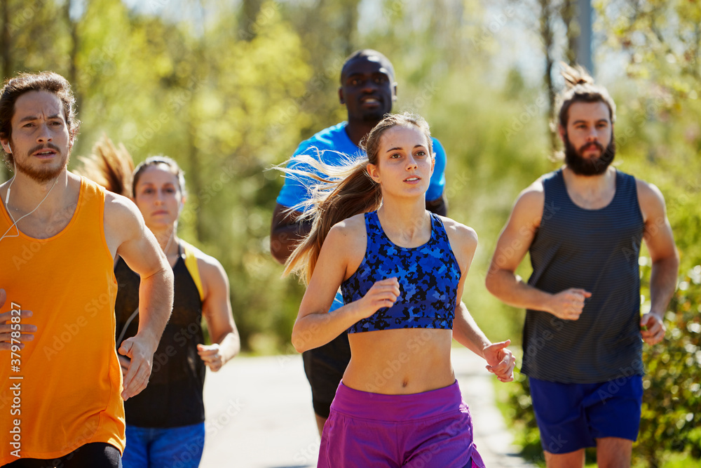 Sporty Athletes Jogging On Street Sporty Athletes Jogging On Street