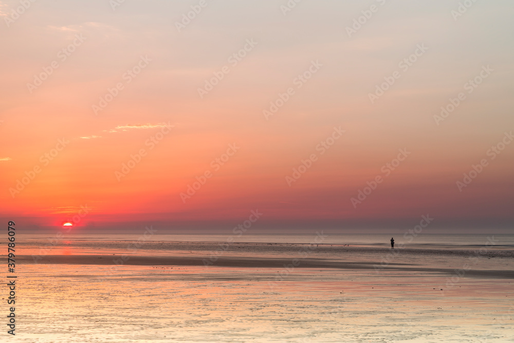 Vibrant orange sunset over the North Sea Vibrant orange sunset over the North Sea