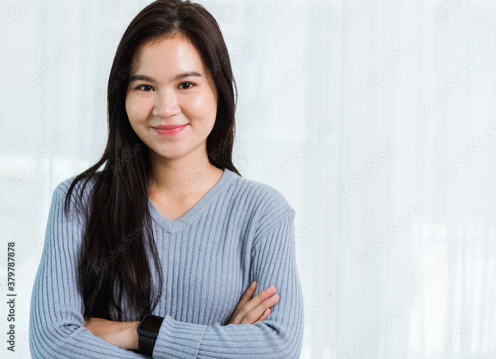 Asian beautiful woman smiling face long hair stand crossed arm Asian beautiful woman smiling face long hair stand crossed arm