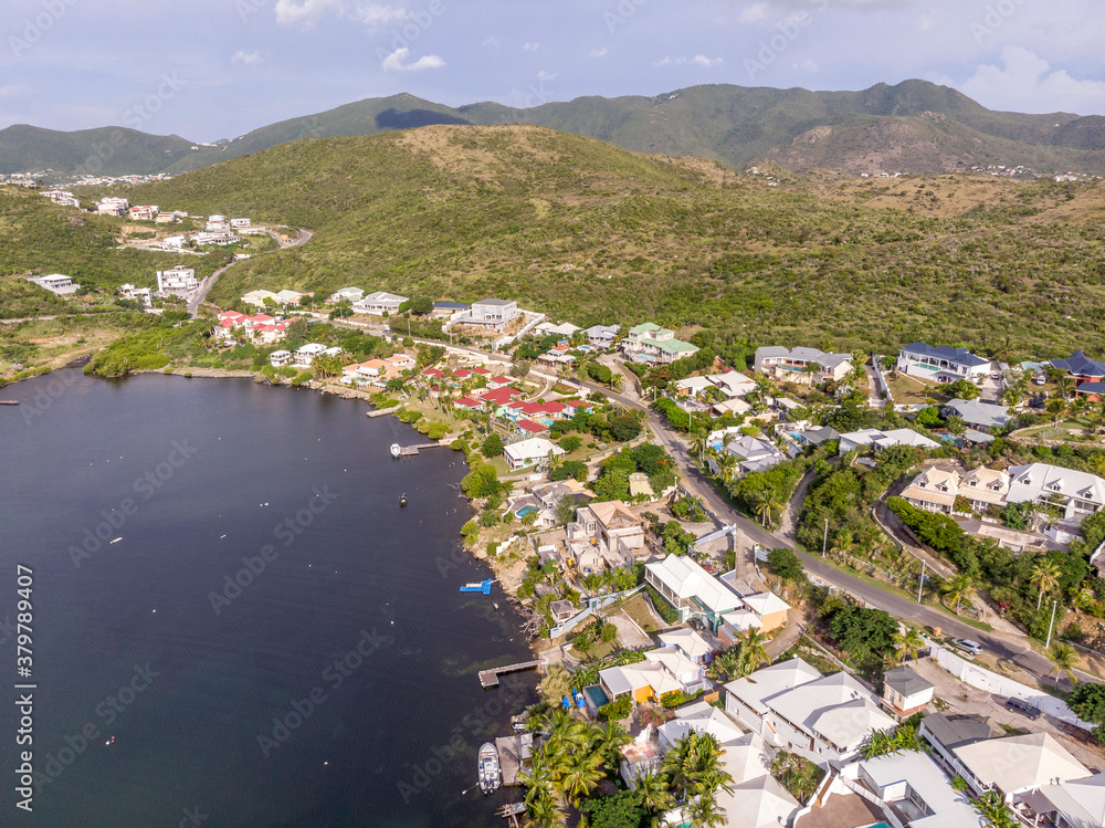 Naklejka premium Aerial view of the Caribbean island of Sint maarten /Saint Martin. Aerial view of oyster pond and dawn beach city scape on st.maarten.