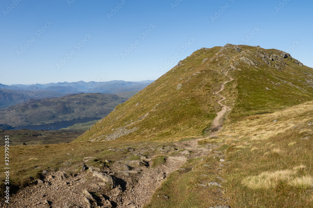 Climbing Ben Ledi in the Trossachs, Ben Ledi is a mountain in Stirling, Scotland. It is 879 m high, and is classified as a Corbett. It lies about 6.4 kilometres north-west of Callander