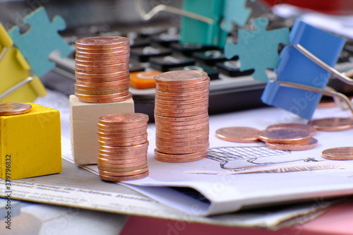 Stack of golden coins on black background and Business growth strategy of money concept