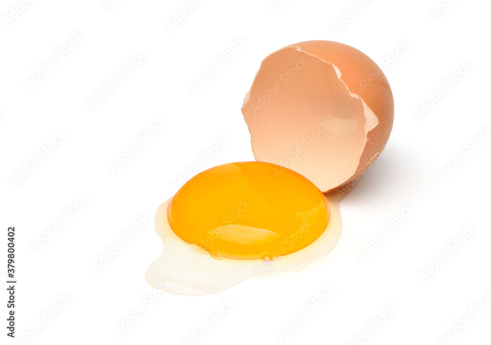 Egg yolk half eggshell isolated on a white background. Egg yolk half eggshell isolated on a white background.