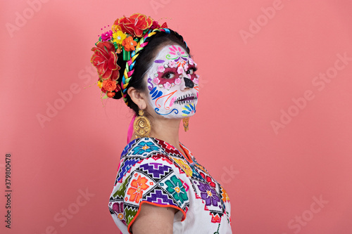 A young woman disguised as a catrina © Moy Ortega