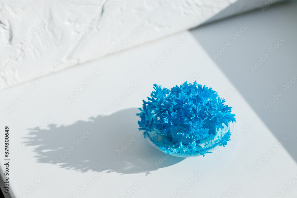 blue chemical crystals forming. needle like Urea crystals ,carbamide