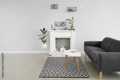 Modern fireplace with shelv...