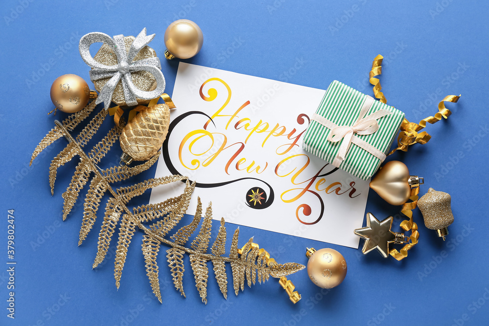 Naklejka premium Beautiful composition with New Year greeting card on color background