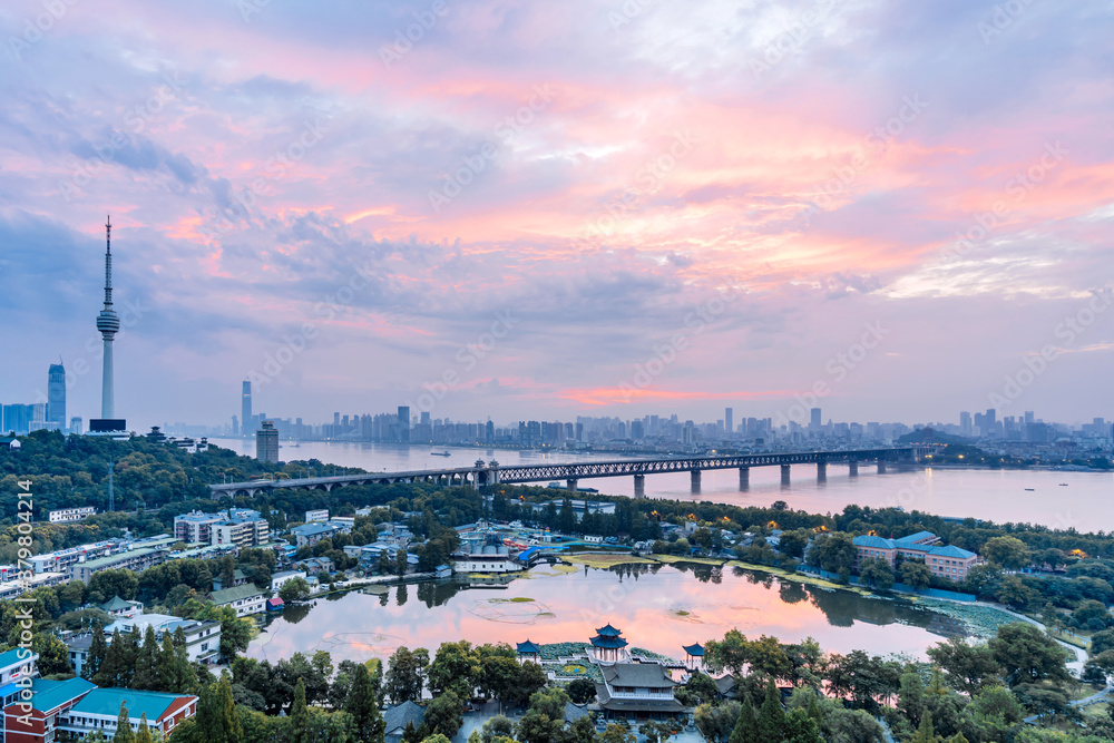 Early morning colorful clouds at Guishan TV Tower and Yangtze River Bridge in Wuhan, Hubei, China