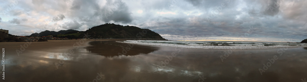 Spanish beach in Deba at sunset after a storm Spanish beach in Deba at sunset after a storm