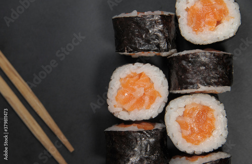 Japanese sushi maki on background. 