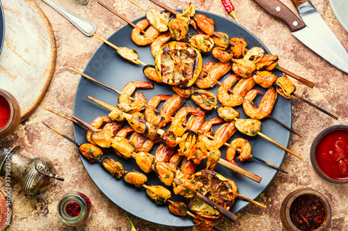 Grilled shrimp and mussels skewers