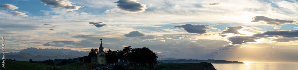 Panorama of a sunset by the cantabrian sea at the coast of Cantabria, Spain