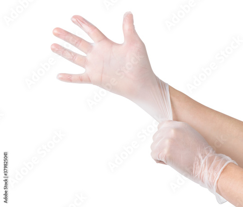 Medical gloves.Two white surgical gloves isolated on white background with hands. Rubber glove manufacturing, human hand is wearing a latex glove. Doctor or nurse putting on protective gloves