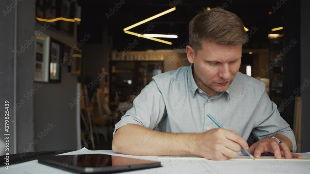 Young man with tablet at work in the office Young man with tablet at work in the office