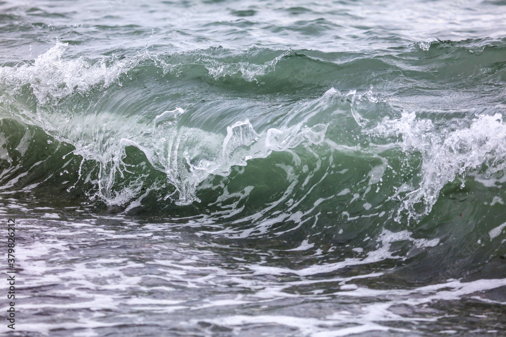 Fototapeta premium Wave in the sea with splashing water.