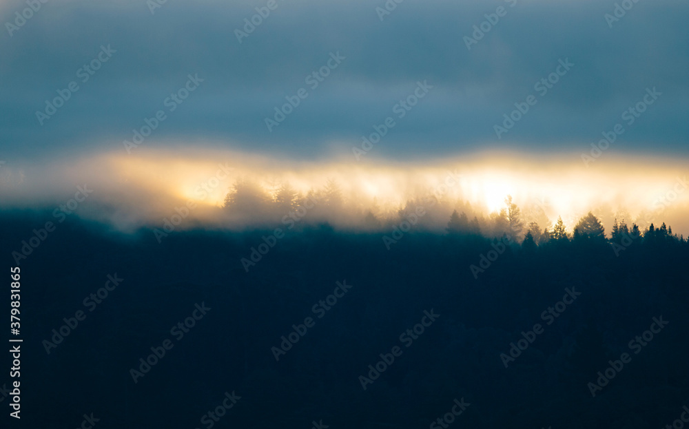 A mix of fog, clouds and sunshine as the sun rises A mix of fog, clouds and sunshine as the sun rises