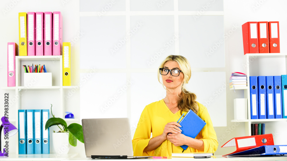 Do It Now. receptionist work on reception. female business leader. woman sit at her desk in office. Business woman working in office with documents. Professional designer at workplace in office Do It Now. receptionist work on reception. female business leader. woman sit at her desk in office. Business woman working in office with documents. Professional designer at workplace in office