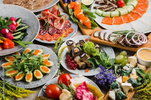 many beautiful dishes and salads for the buffet