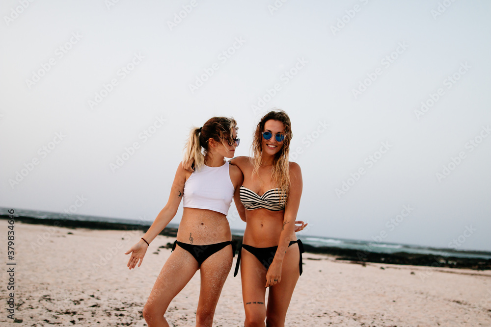 Portrait of two funny friends on the beach Portrait of two funny friends on the beach