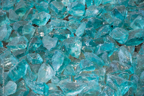 Texture of ice of blue color. Background from crystals