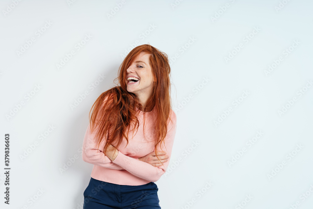 Young woman enjoying a good laugh Young woman enjoying a good laugh