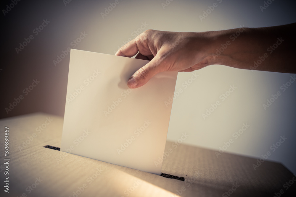 Conceptual image of a person voting during elections Conceptual image of a person voting during elections
