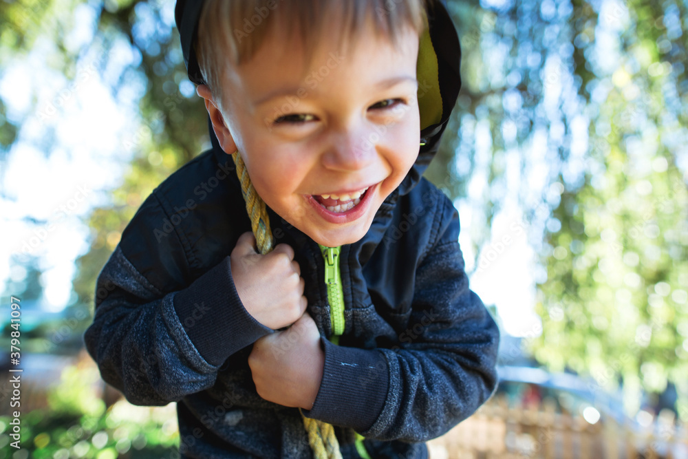 Happy kid on tire swing Happy kid on tire swing