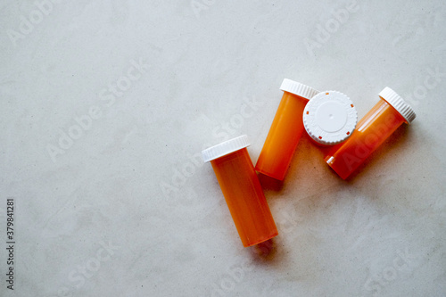 Empty prescription pill bottles from the pharmacy.Empty pills bottles for wallpaper
