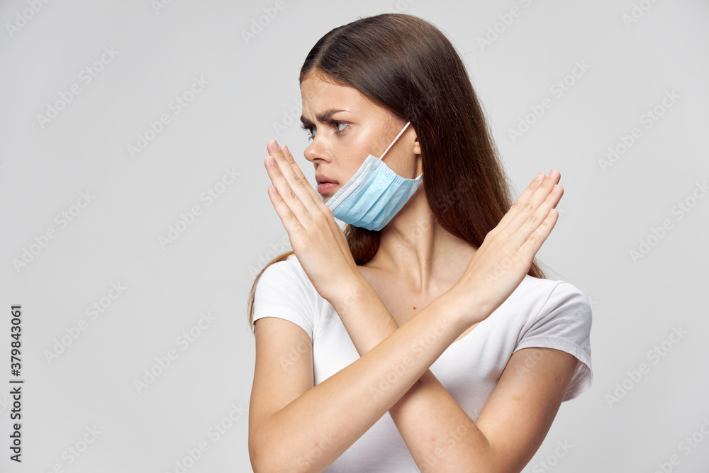 woman wearing medical mask folded her arms in front of her side view health problem woman wearing medical mask folded her arms in front of her side view health problem