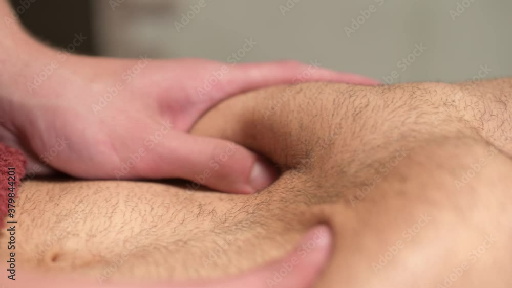 Close-up massage activation of the diaphragm in a male athlete. Professional sports massage of internal organs Close-up massage activation of the diaphragm in a male athlete. Professional sports massage of internal organs