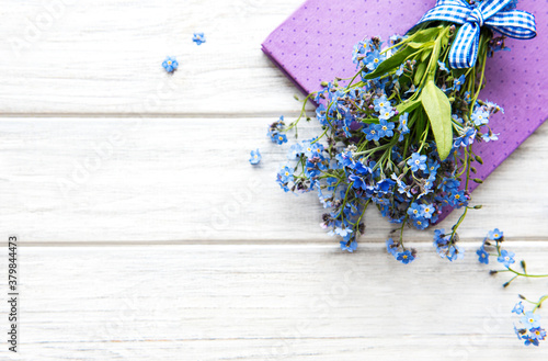 Forget-me-not flowers and notebook